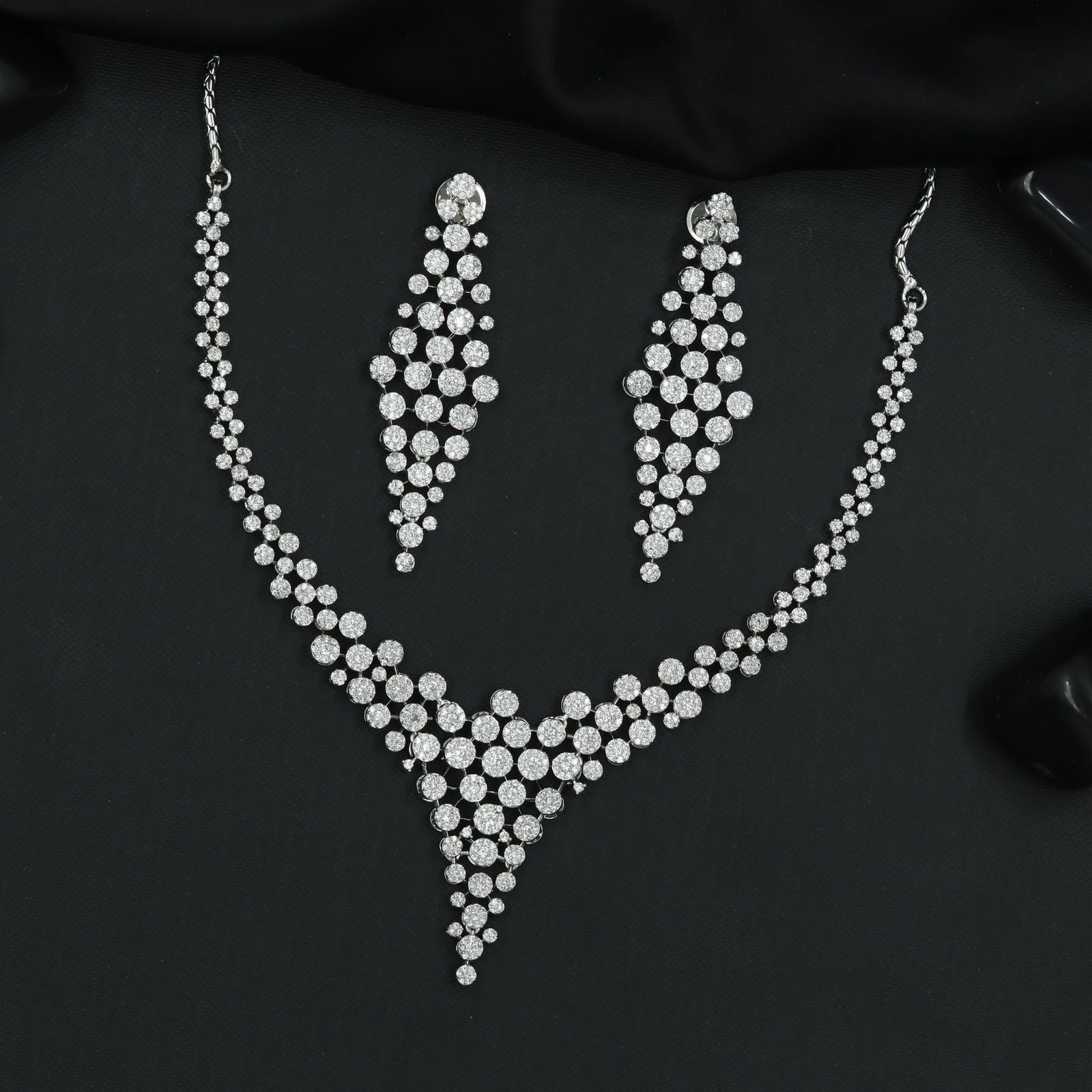 Radiant Circular Pattern Necklace Set with Cascading Cluster Pendant