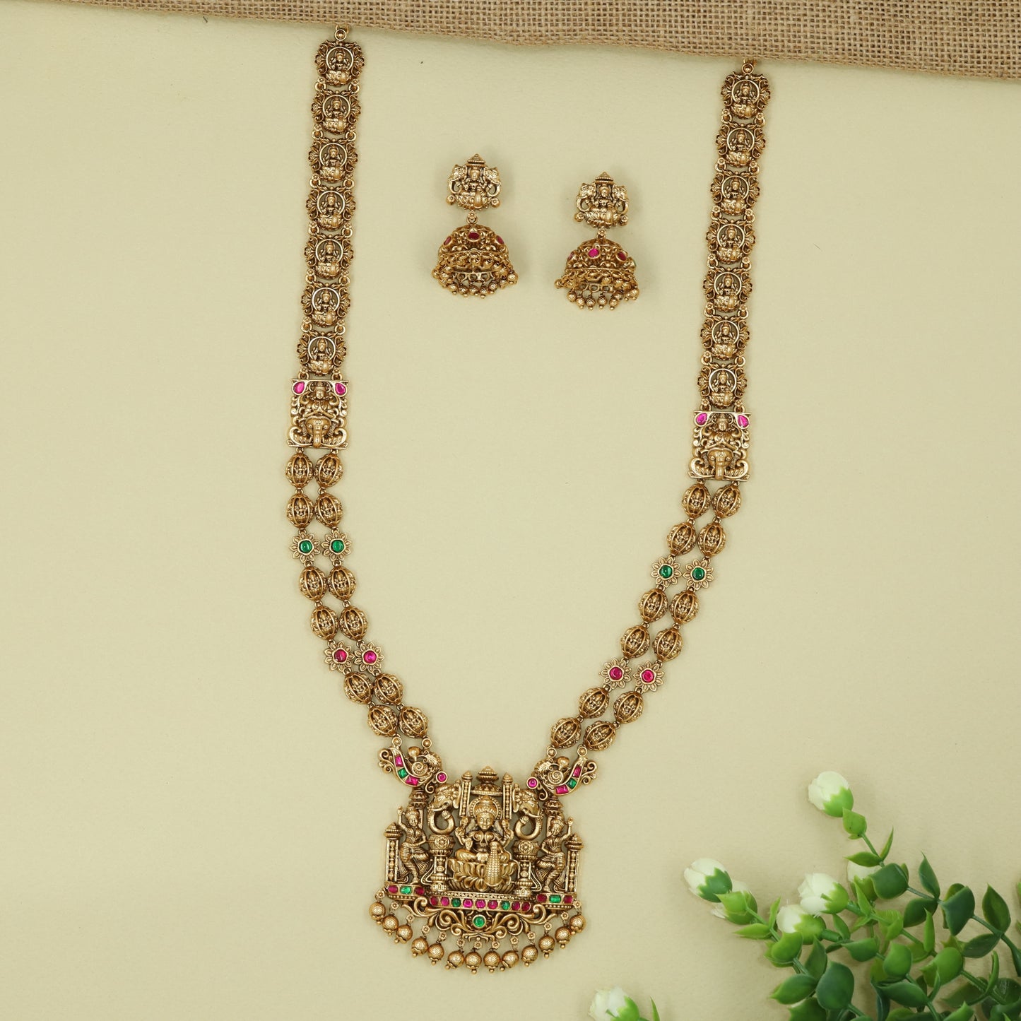 Exquisite Lakshmi Shrine Long Haara with Heritage Motif Links and Pendant Drop