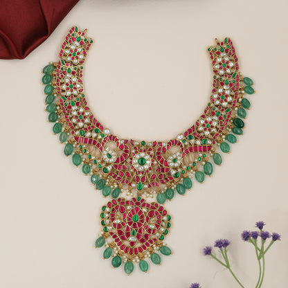 Graceful Peacock Motif Jadau Necklace with Statement Heart Shape Pendant
