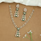 Linear Pattern Necklace with Repeating Units and Elongated Pendant Detail