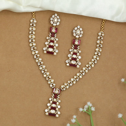 Linear Pattern Necklace with Repeating Units and Elongated Pendant Detail