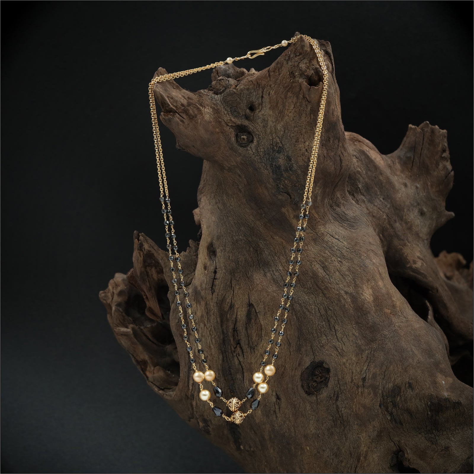 Sleek Dual Strand Beads with Fine Chain and Faceted Accents