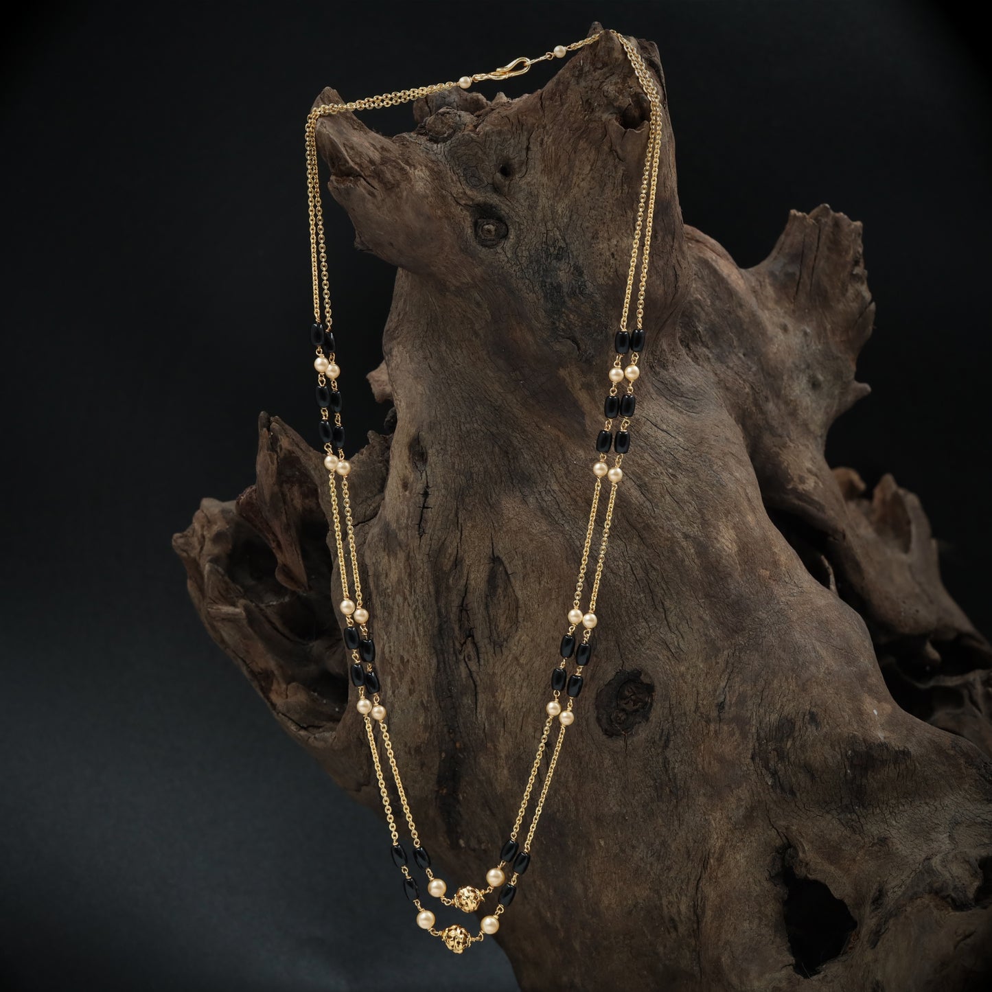 Opulent Dual Chain Beads with Black Bead Segments and Round Highlights