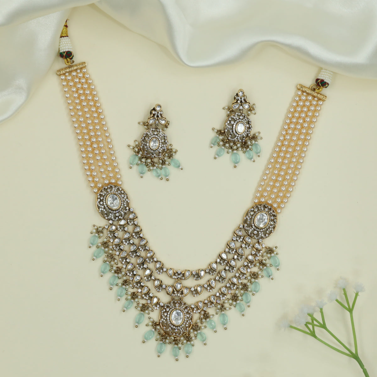 Draped Multi Strand Necklace with Central Kundan Layers and Hanging Drop Accents