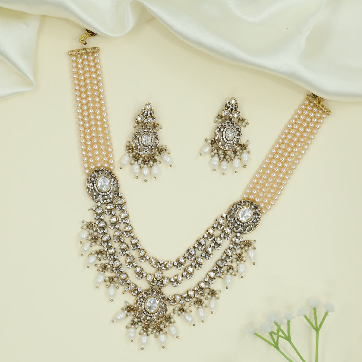 Draped Multi Strand Necklace with Central Kundan Layers and Hanging Drop Accents