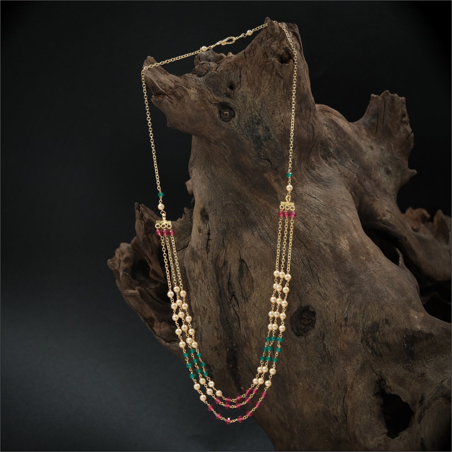Slender Beads with Symmetrical Drop Formation