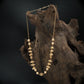 Stylish Bead with Structured Pearl Intervals and Detailed Cluster Work