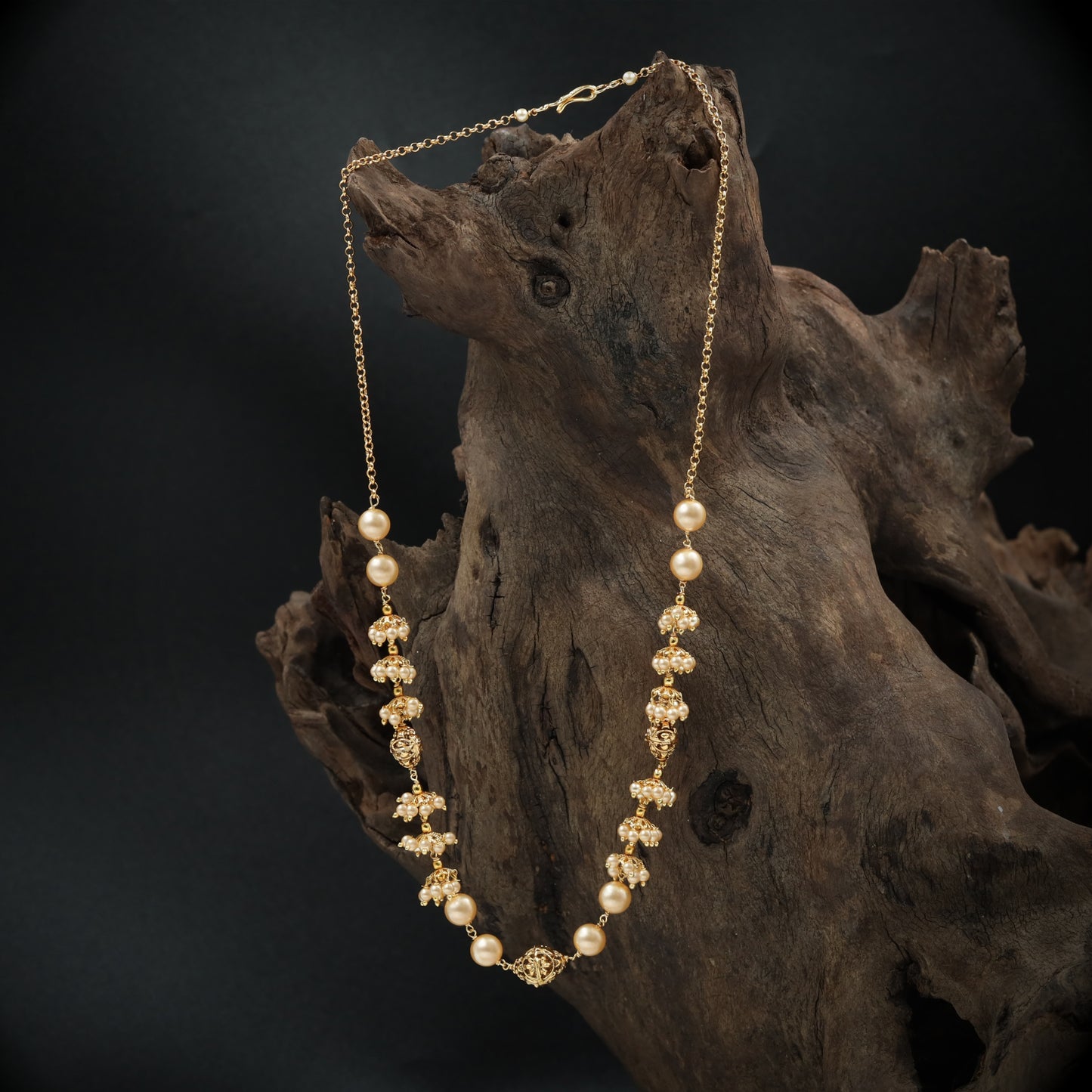 Stylish Bead with Structured Pearl Intervals and Detailed Cluster Work