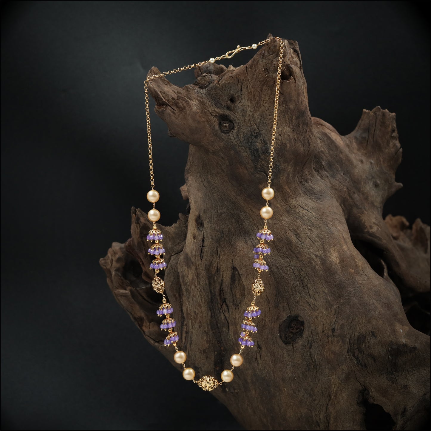 Stylish Bead with Structured Pearl Intervals and Detailed Cluster Work
