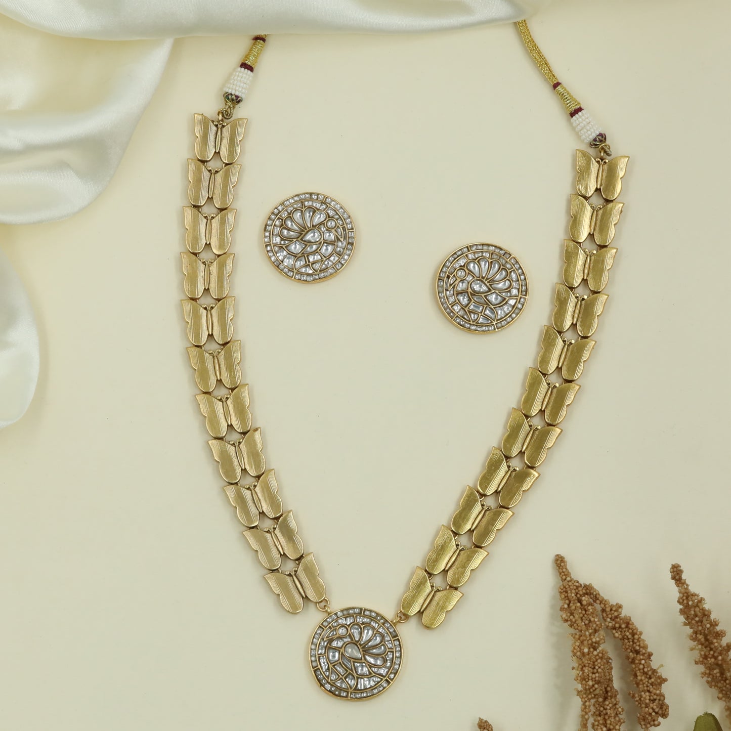 Butterfly Link Kundan Necklace with Wing Segments and Circular Pendant