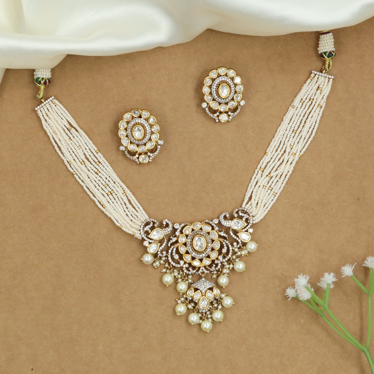 Radiant Bead Draped Kundan Necklace with Round Core Pendant and Drop Clusters