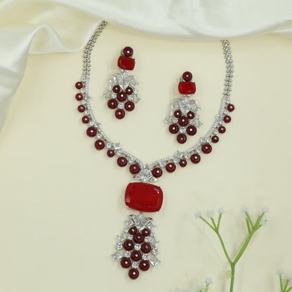 Refined Arc Design Necklace with Repeating Round Drops and Structured Centerpiece