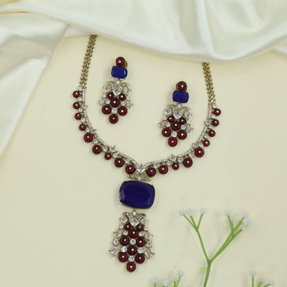 Refined Arc Design Necklace with Repeating Round Drops and Structured Centerpiece