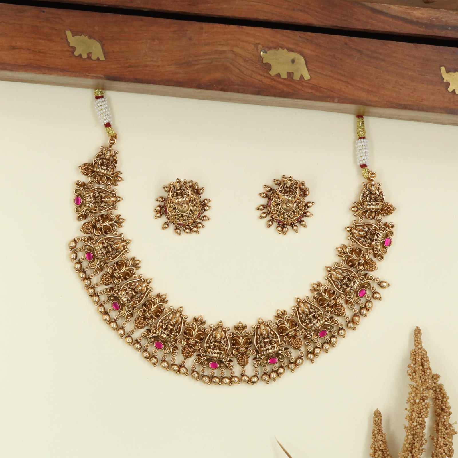 Grand Lakshmi Design Necklace with Carved Units and Drop Border Detailing