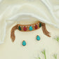 Curved Band Matt Choker with Alternating Carved Panels and Tassel Ends