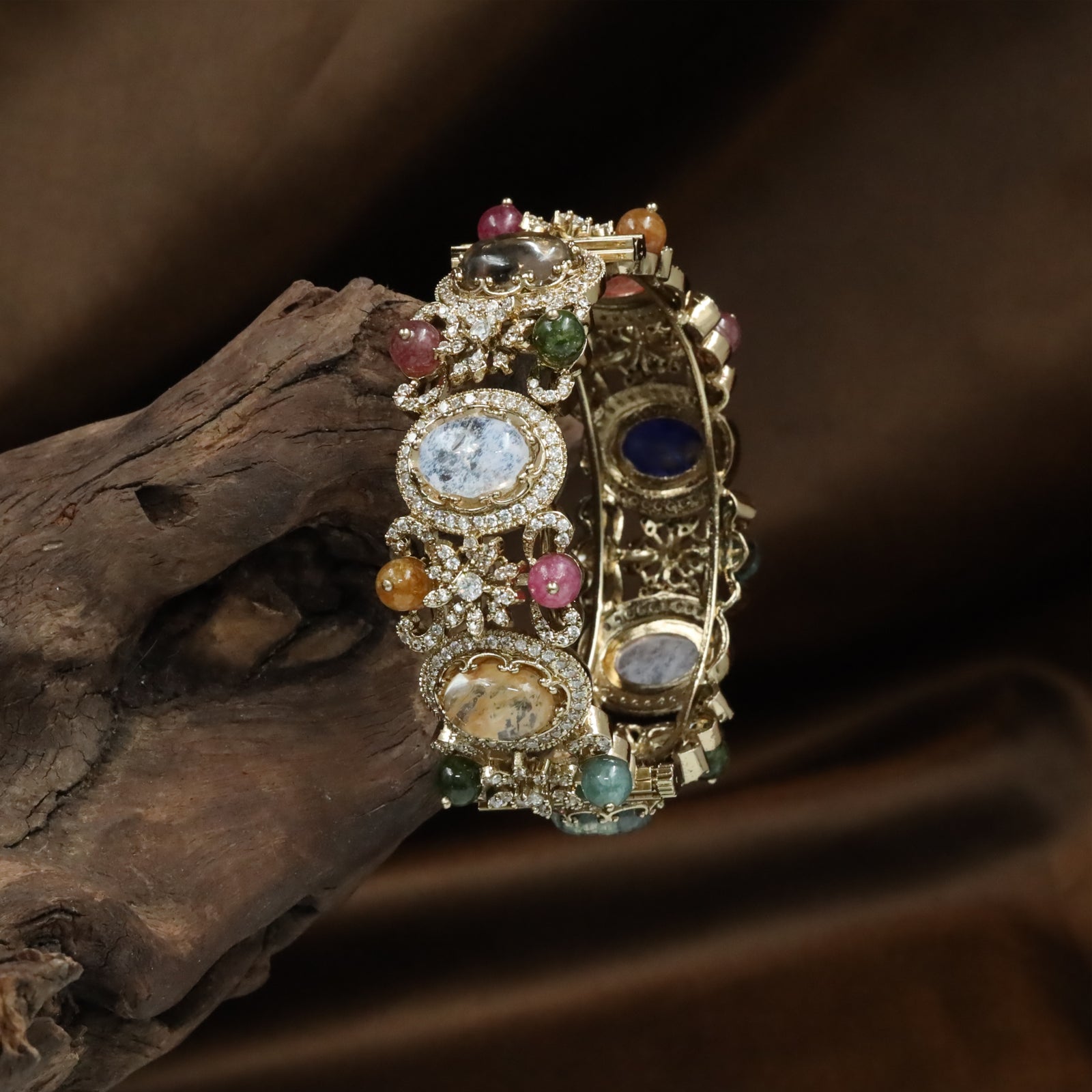 Oval Centre Kundan Bangles with Floral Cluster Detailing and Raised Frames