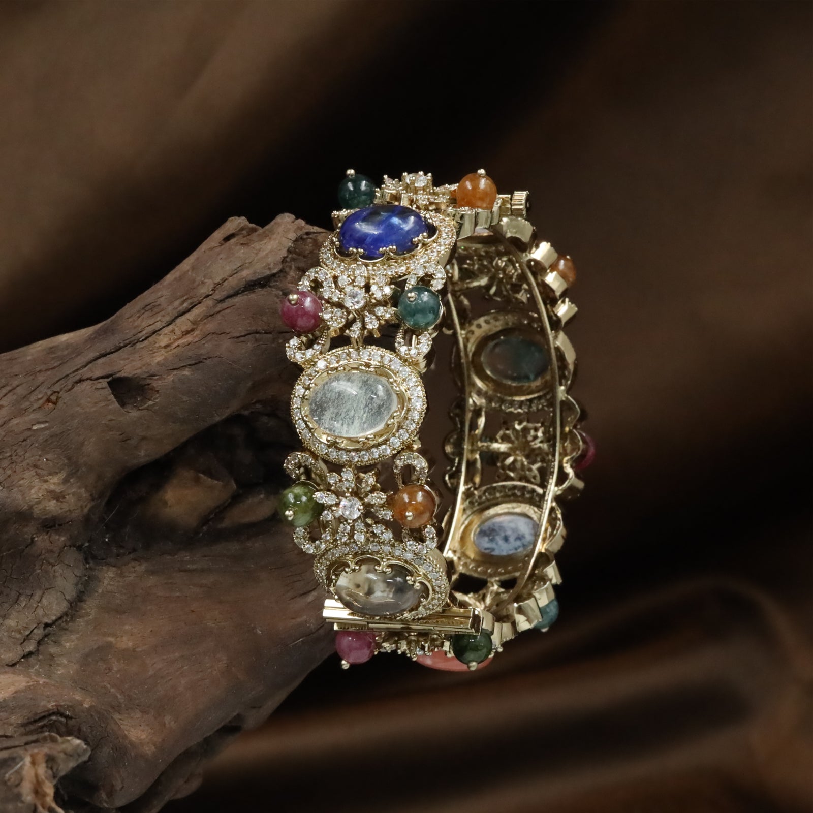 Oval Centre Kundan Bangles with Floral Cluster Detailing and Raised Frames