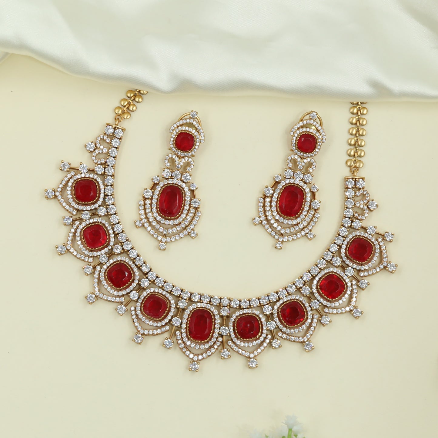 Grove Pattern Gold Necklace with Oval Units and Radiating Border Elements