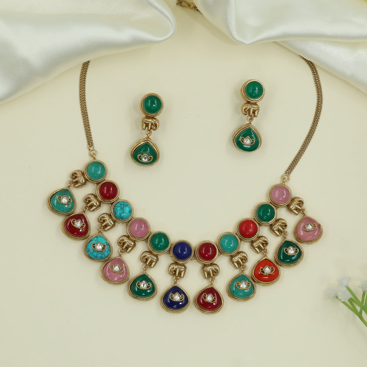 Gleaming Elephant Chain Gold Choker with Round Charms and Drop Elements