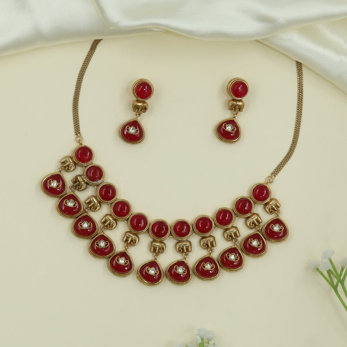 Gleaming Elephant Chain Gold Choker with Round Charms and Drop Elements