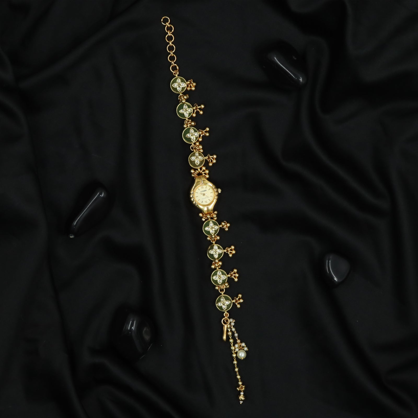 Circular Floral Kundan Watch with Repeating Round Panels and Chain Tassel Extension