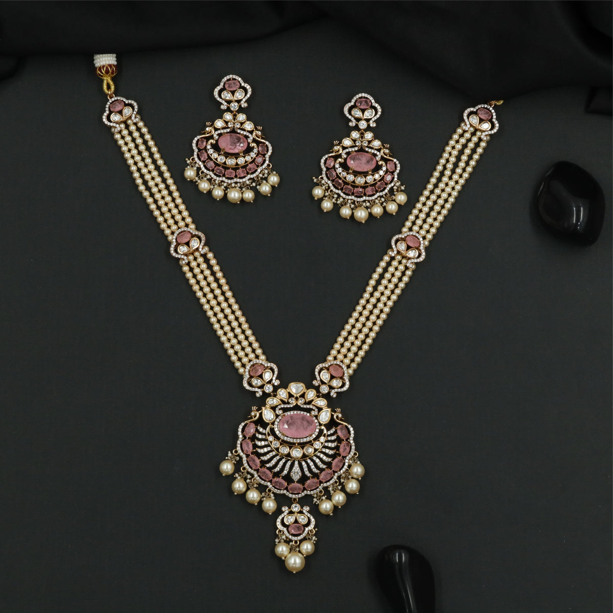 Articulated Multi Strand Kundan Pearl Necklace with Circular Pendant and Pearl Danglers