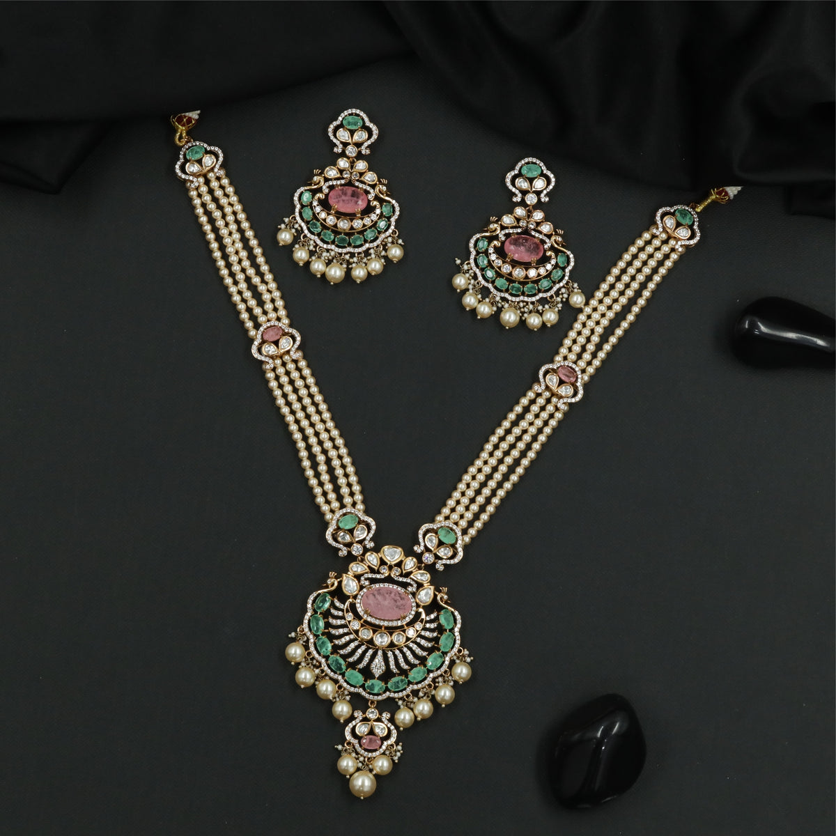 Articulated Multi Strand Kundan Pearl Necklace with Circular Pendant and Pearl Danglers