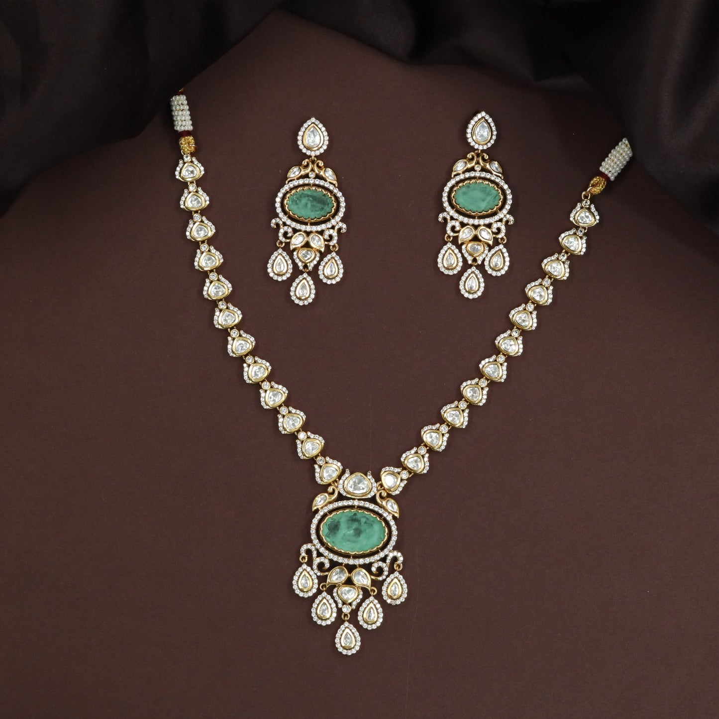 Flowing Drop Link Kundan Necklace with Decorative Pendant and Hanging Frames