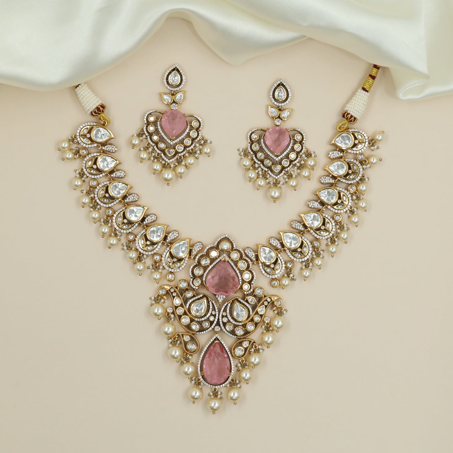 Curving Teardrop Link Kundan Necklace with Grand Central Pendant and Pearl Drops