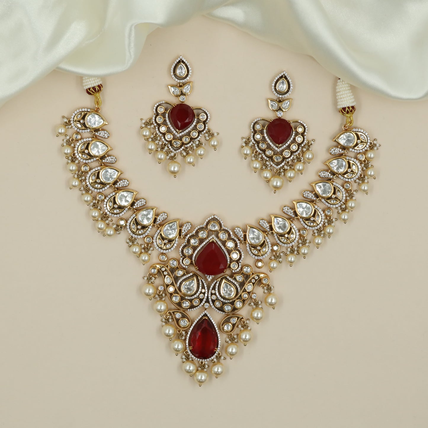 Curving Teardrop Link Kundan Necklace with Grand Central Pendant and Pearl Drops