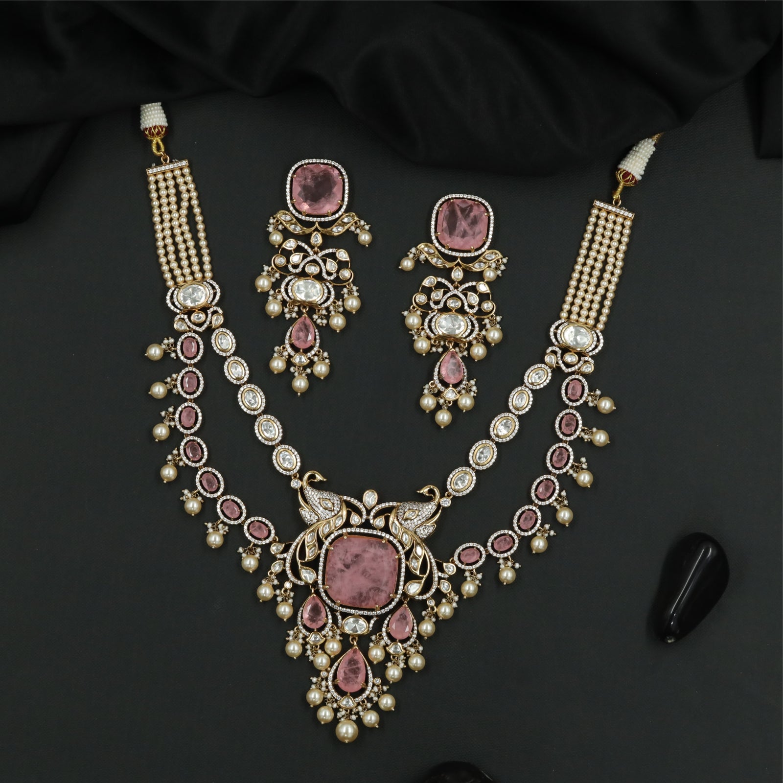 Juxtaposed Oval Pattern Kundan Pearl Necklace with Layered Rows and Hanging Pearls