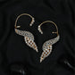 Feather curve Ear bluetooth with sweeping form and dense stone arrangement