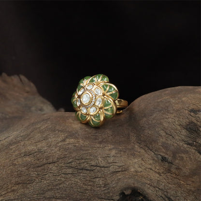 Floral centre kundan finger ring with circular core and surrounding petal segments