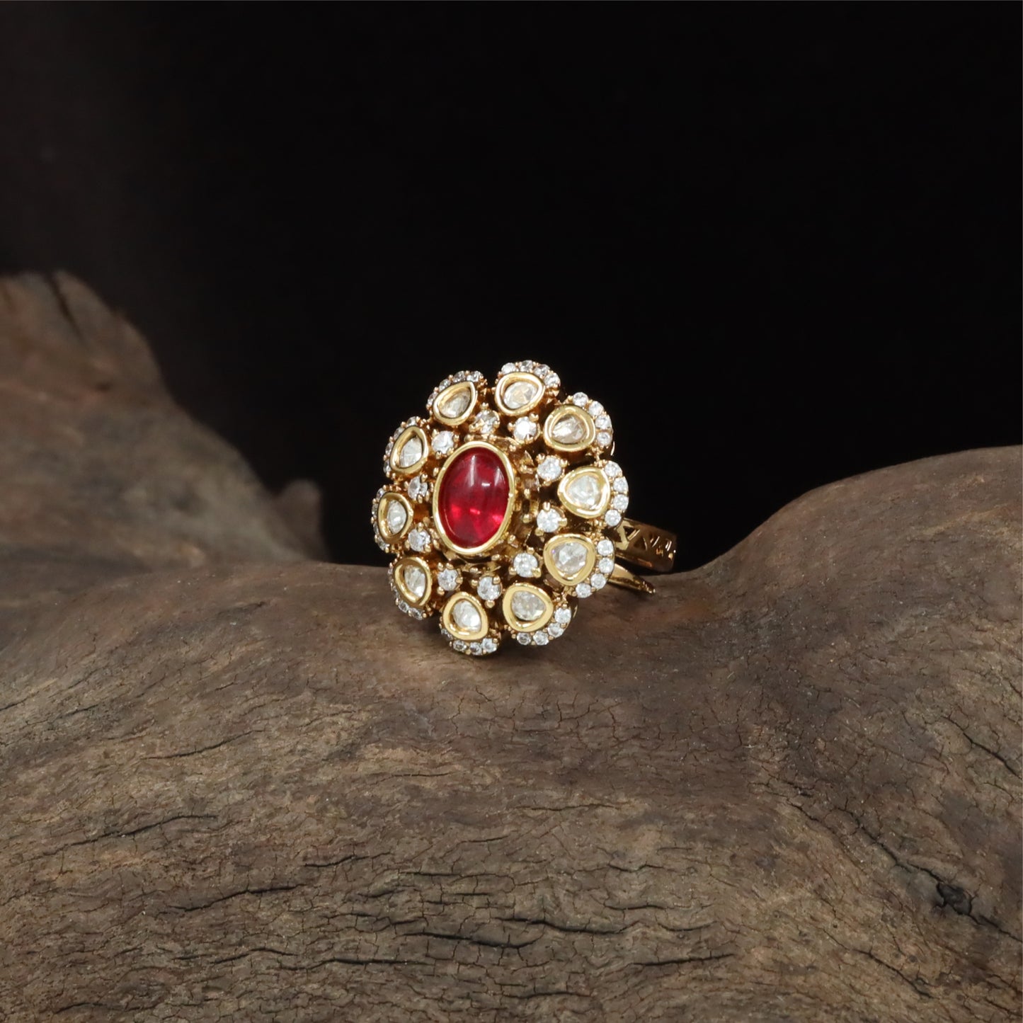 Brisk bloom kundan finger ring with elongated centre and radial placements