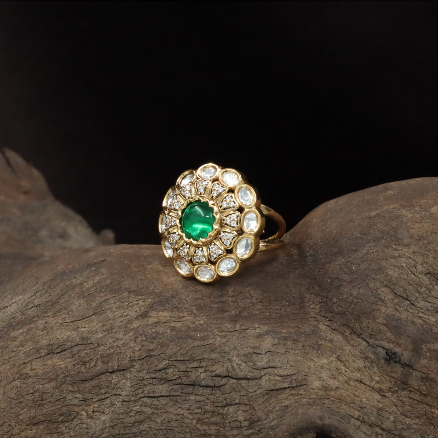 Central bloom kundan finger ring with scalloped round core and surrounding oval units