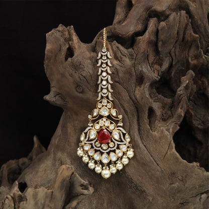 Stylish Long Tikka with Curved Link Alignment and Hanging Pearl Accents