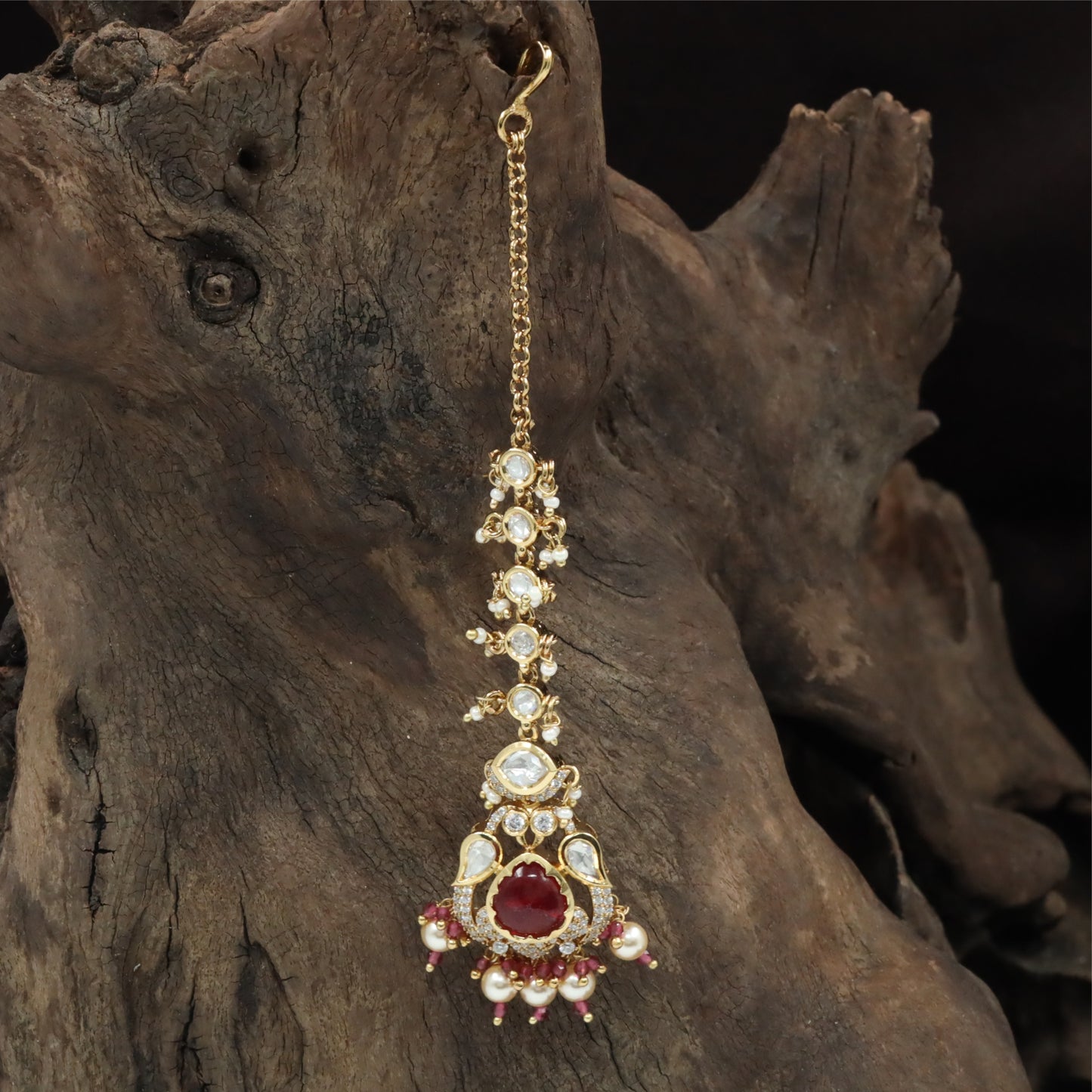 Elegant Linked Kundan Tikka with Repeating Round Units and Hanging Pearl Drops