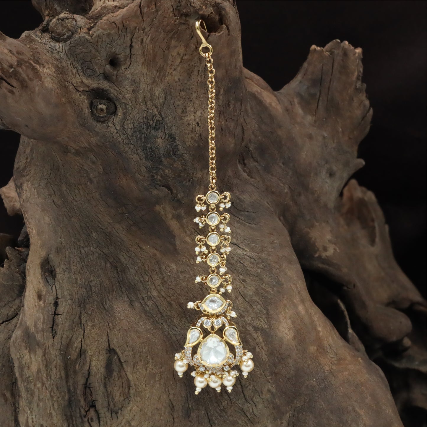 Elegant Linked Kundan Tikka with Repeating Round Units and Hanging Pearl Drops