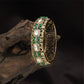 Rising Rectangular Panel Kundan Kada with Floral Side Detailing and Dense Surface
