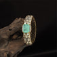 Luxurious Textured Kada with Central Emphasis and Repeating Circular Units