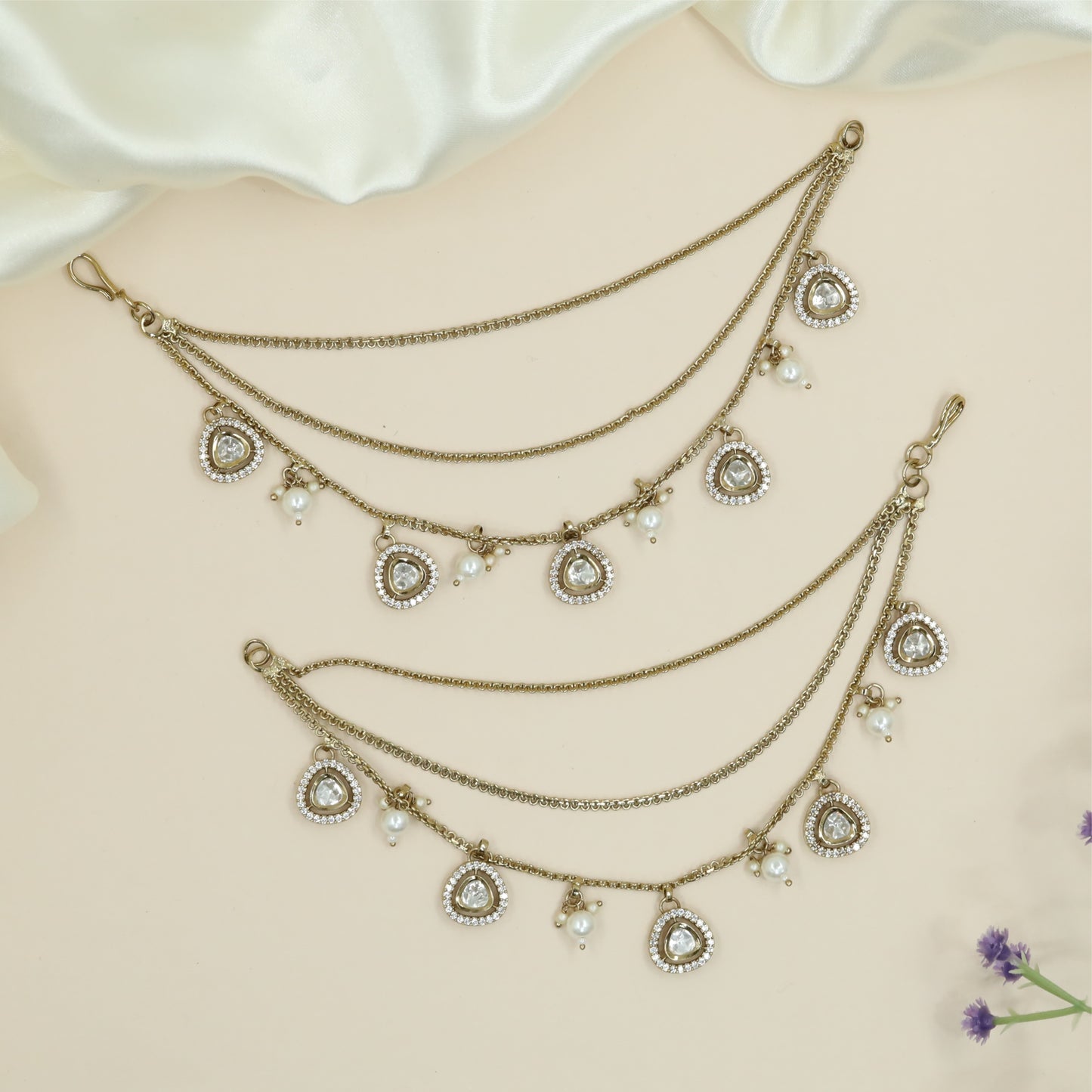 Flowing chain mati with multi row strands and drop pendant accents