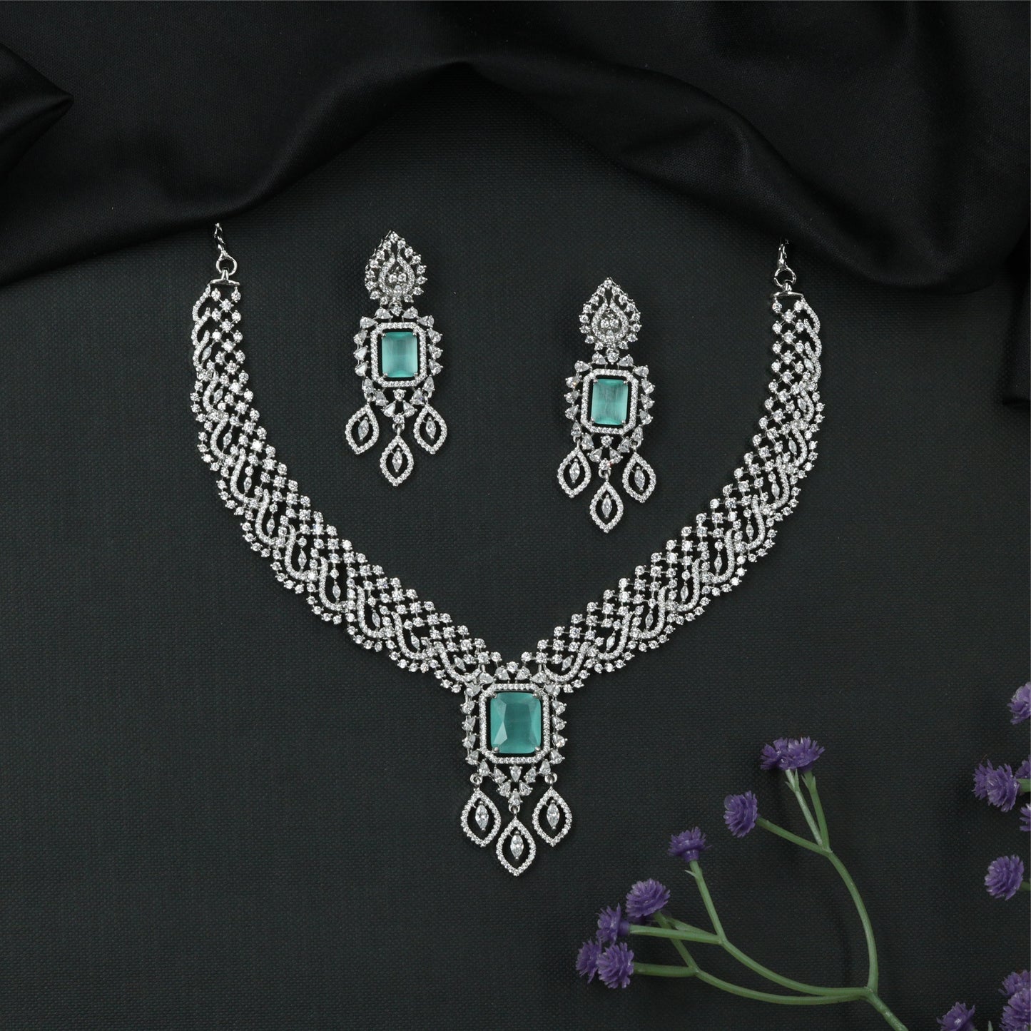 Mesh weave rhodium necklace with structured panels and square drop pendant
