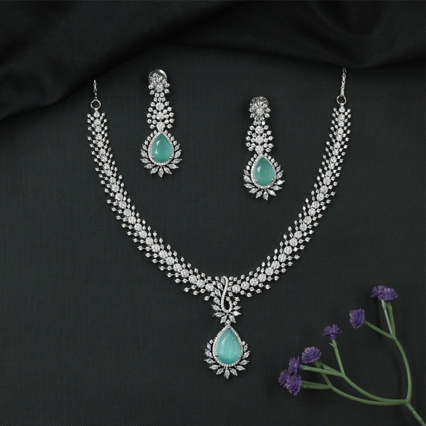 Glissara Curve Necklace with Fine Cluster Rows and Central Hanging Drop