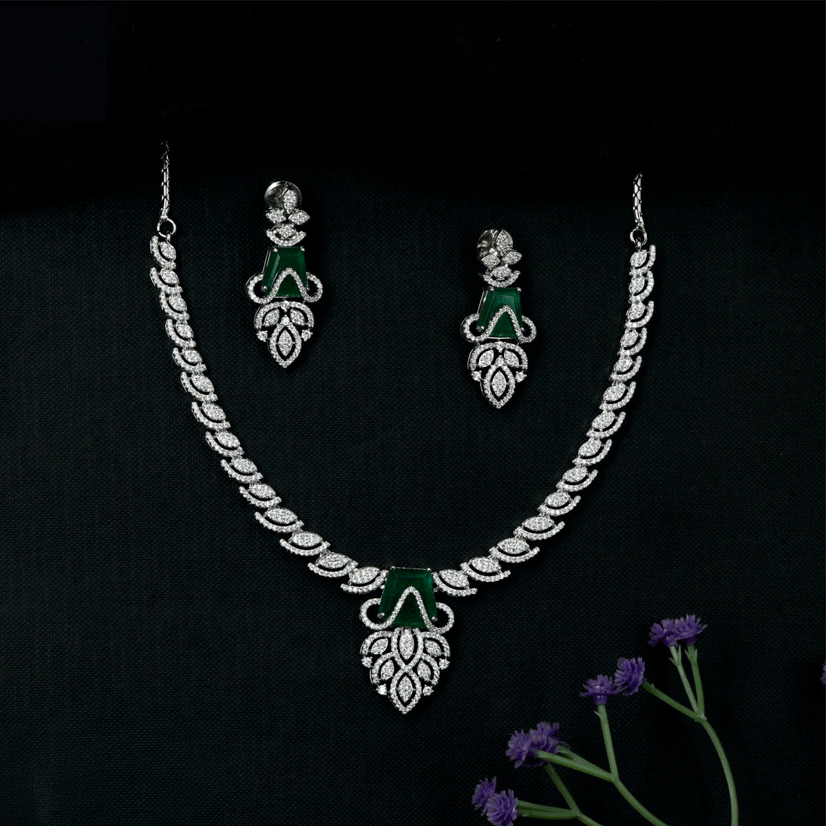 A statement Rhodium Necklace with a leaf-inspired link arrangement