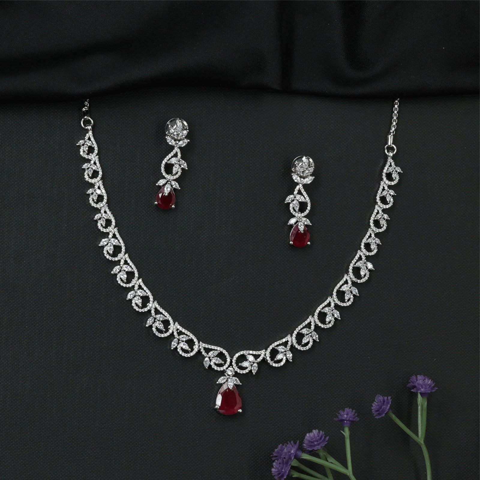 Dovetail Curve Necklace with Interlocked Swirl Connectors and Suspended Drop Element