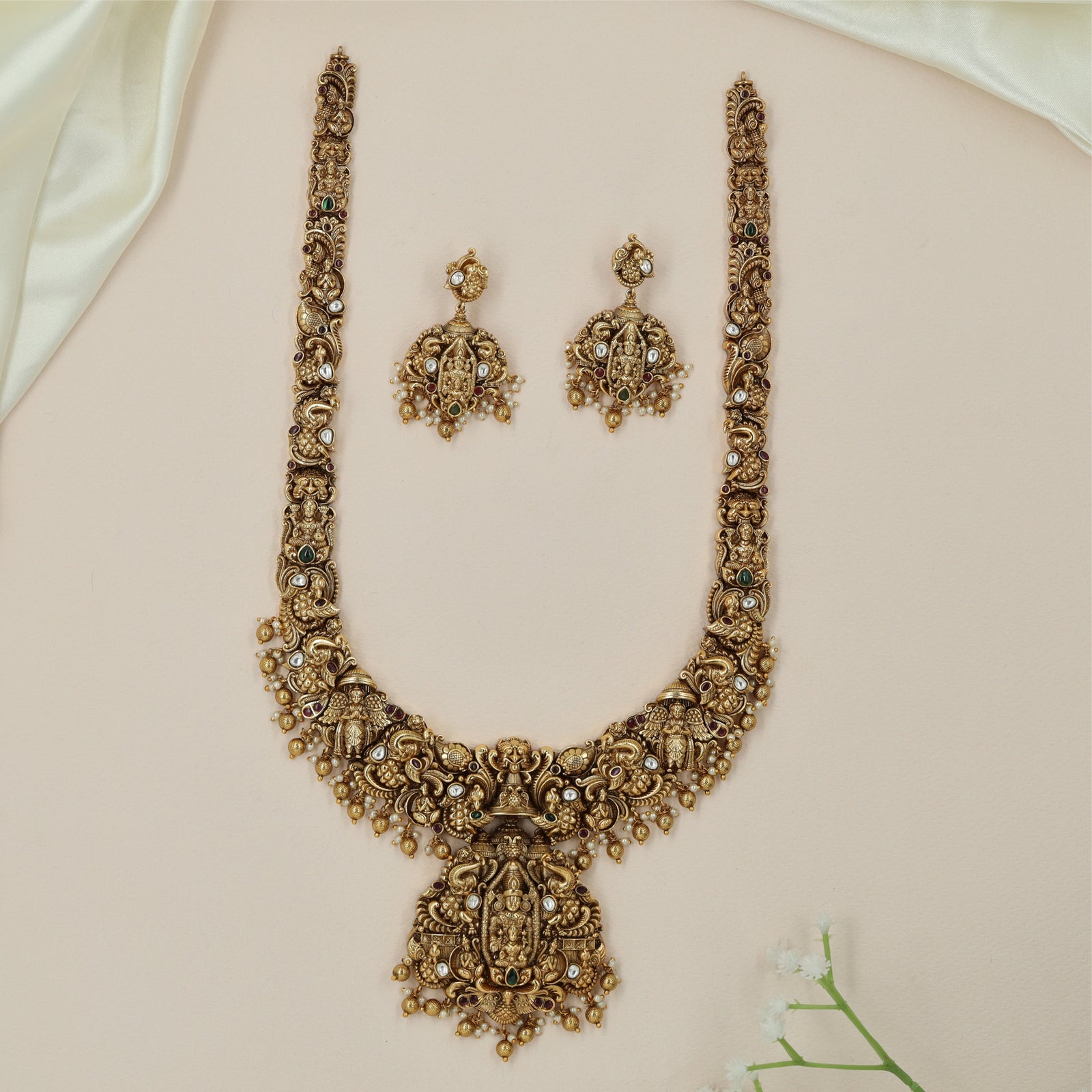 Crowned Venkateshwara Antique Long Haara with Grand Pendant Fringe