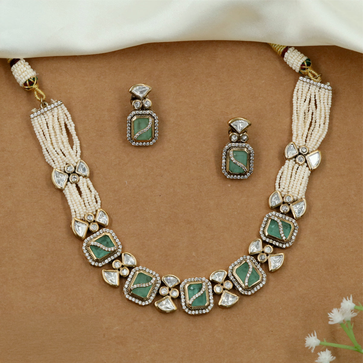 Pearl strand Kundan Necklace featuring an ornate rectangular design