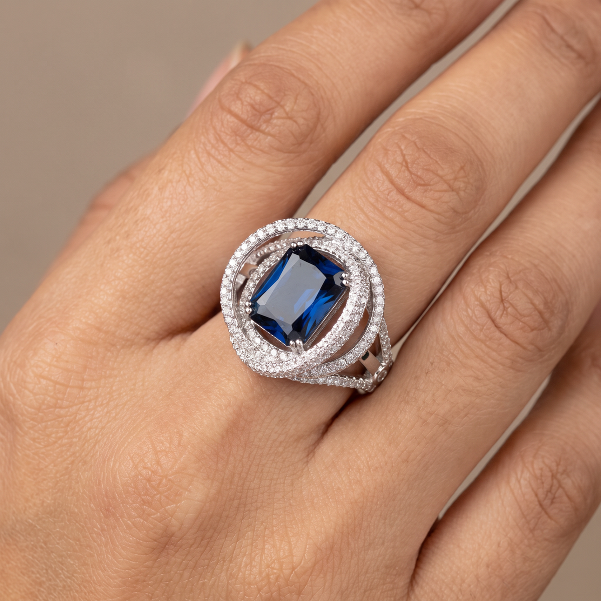 Drape Halo Finger Ring with Elevated Centre Placement