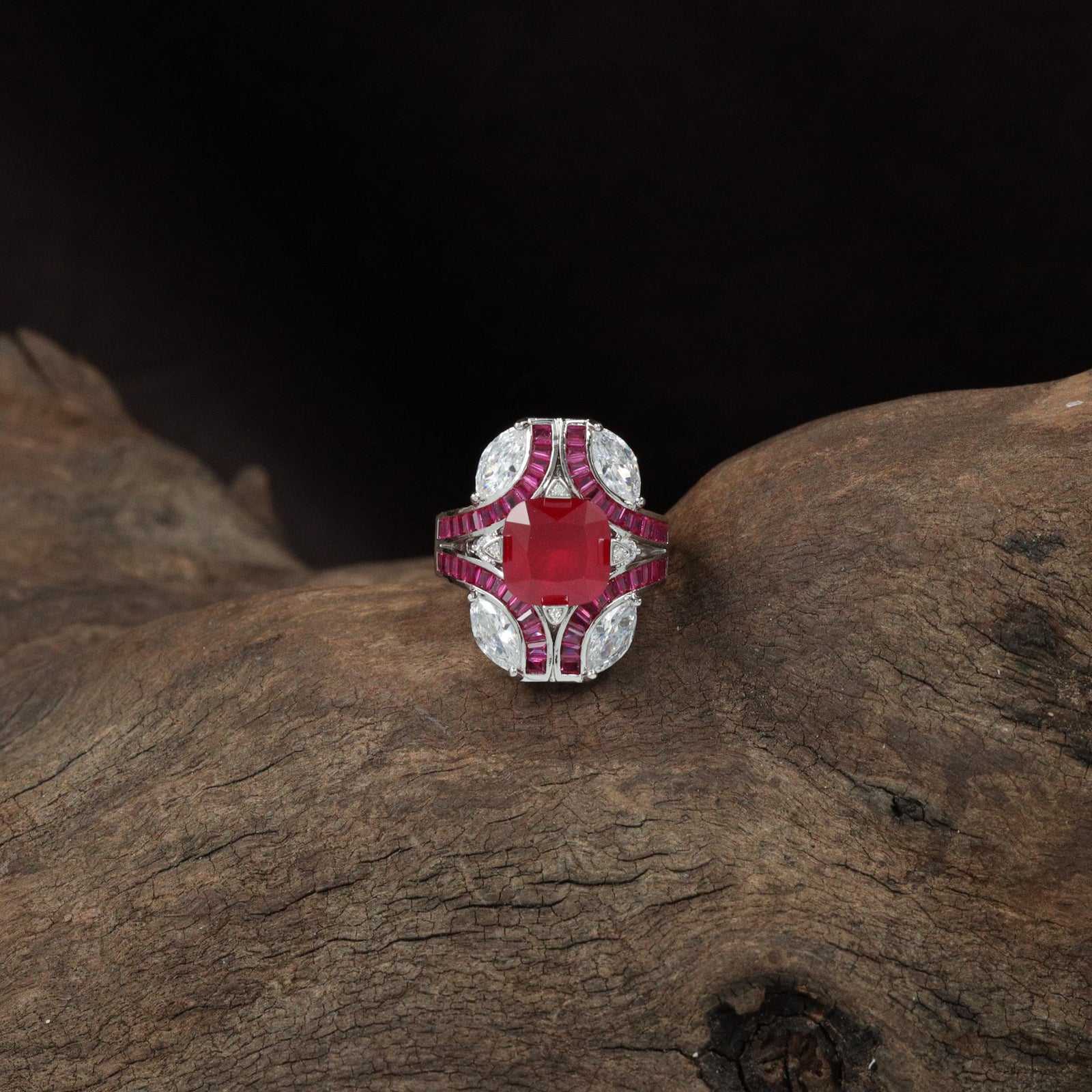 Contour dual‑tone array finger ring arrangement emphasizing symmetry