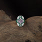 Contour dualâ€‘tone array finger ring arrangement emphasizing symmetry
